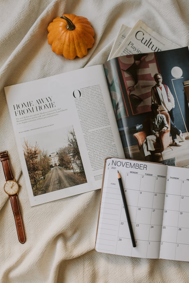 Magazine Beside a Planner