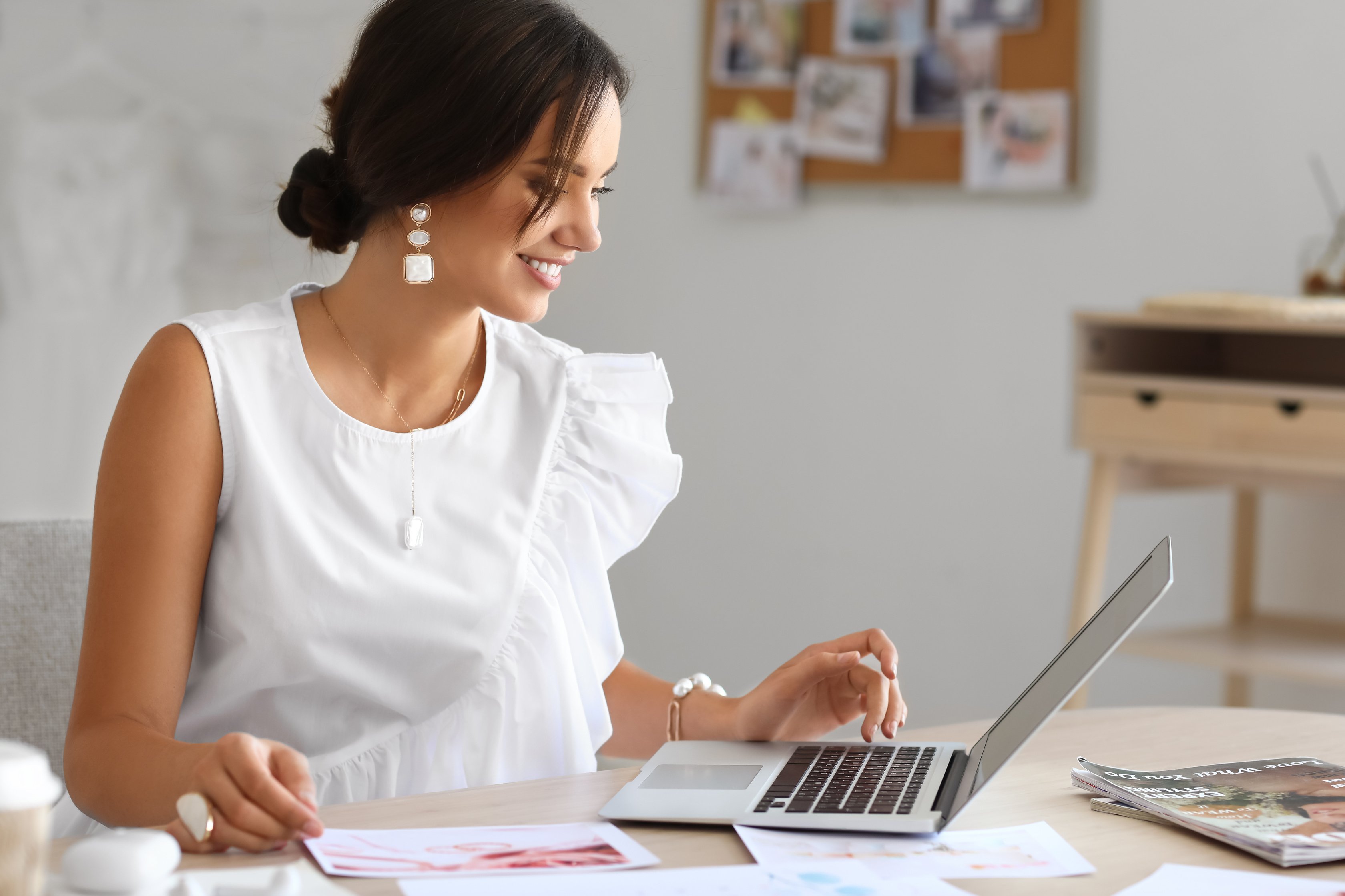 Female Wedding Planner Working in Office